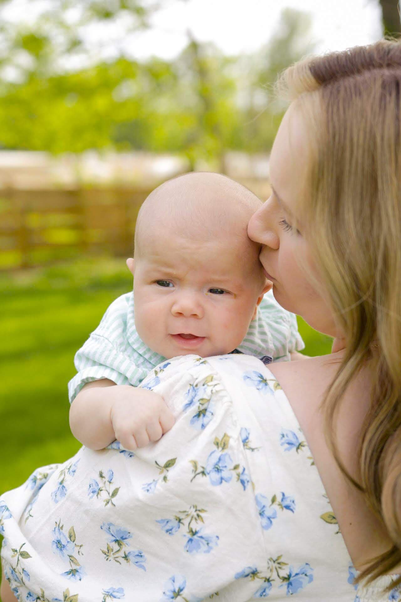 Baby boy on Moms Shoulder