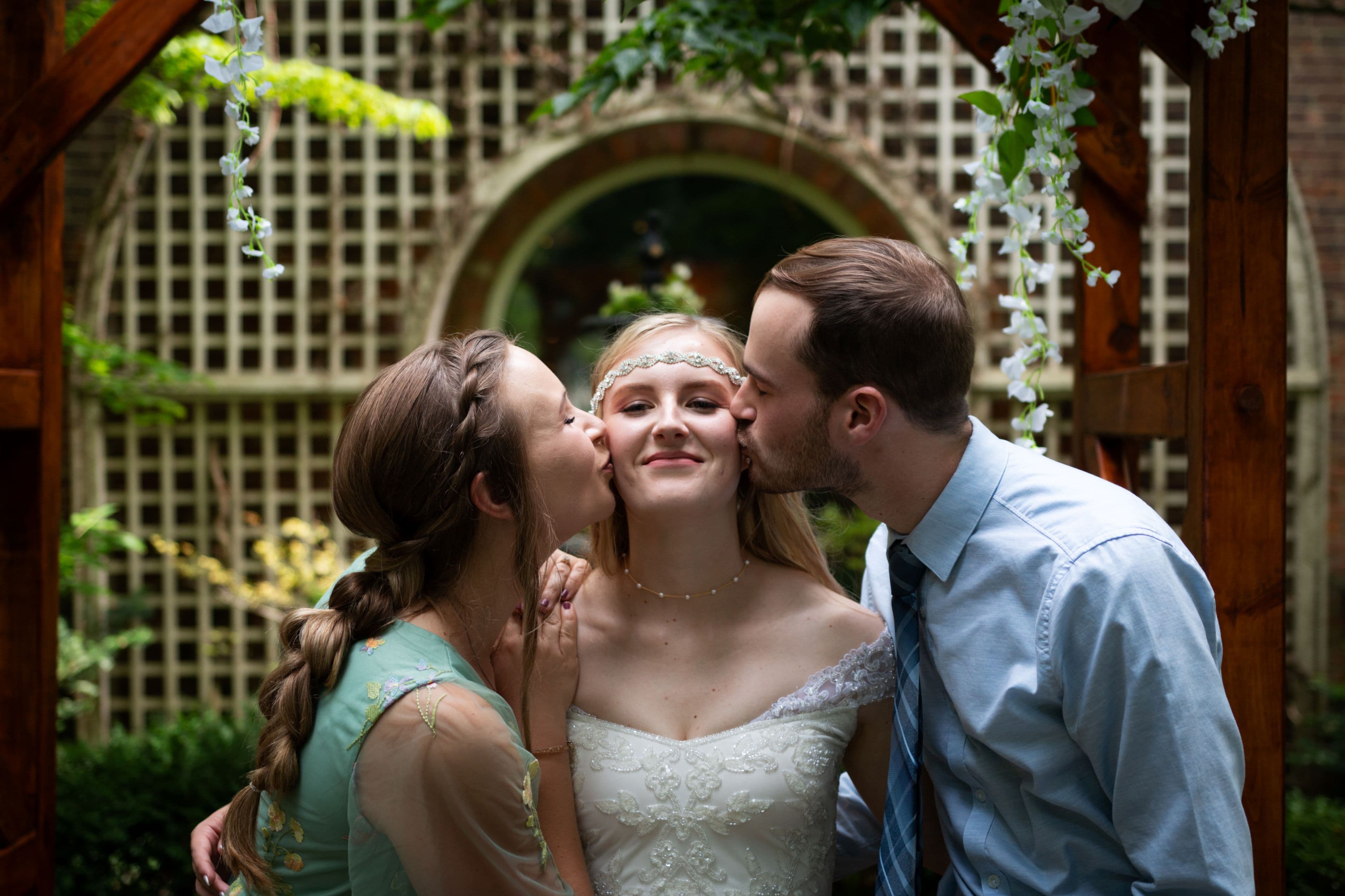 Siblings Cheek Kissing