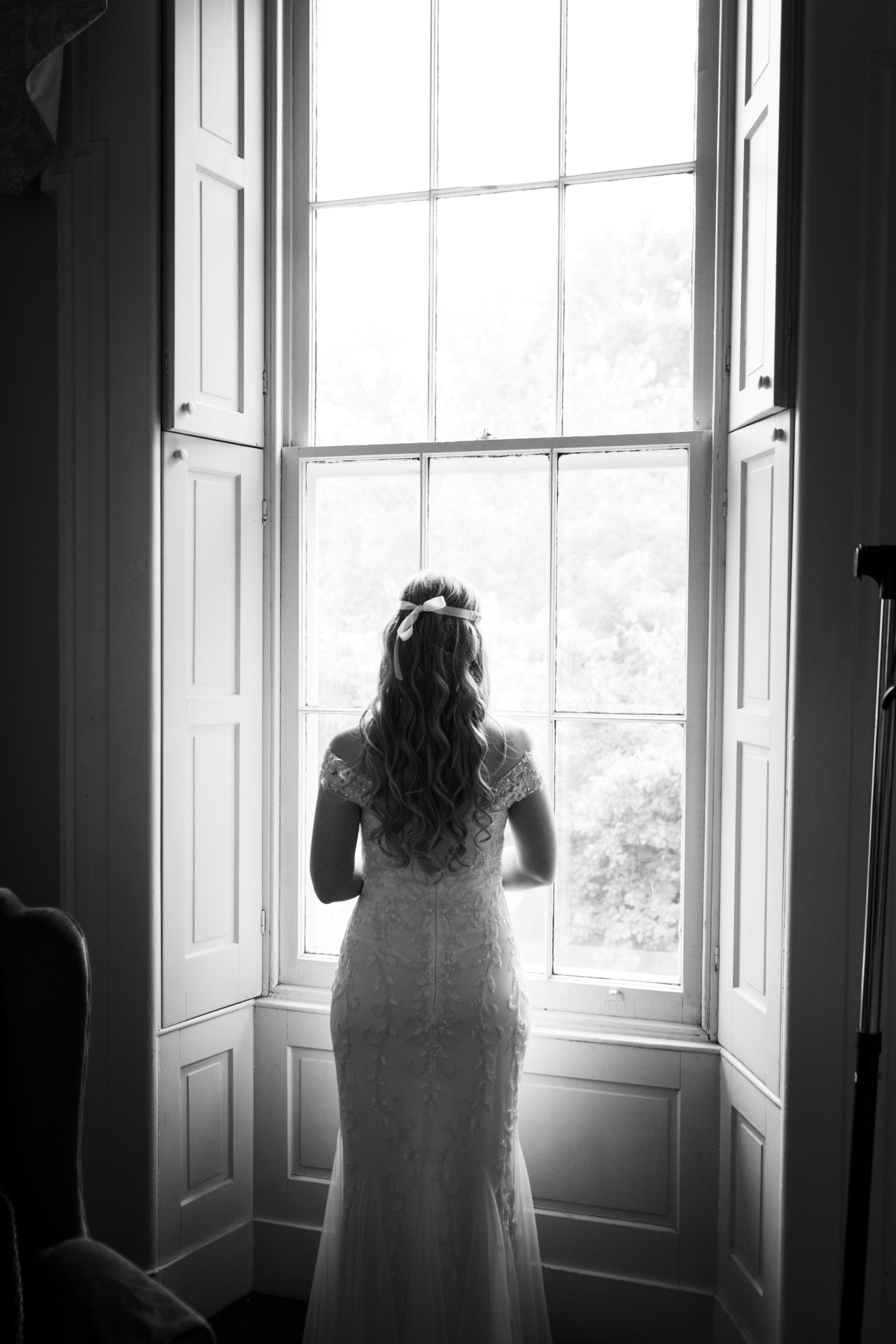 Bride Gazing out Window