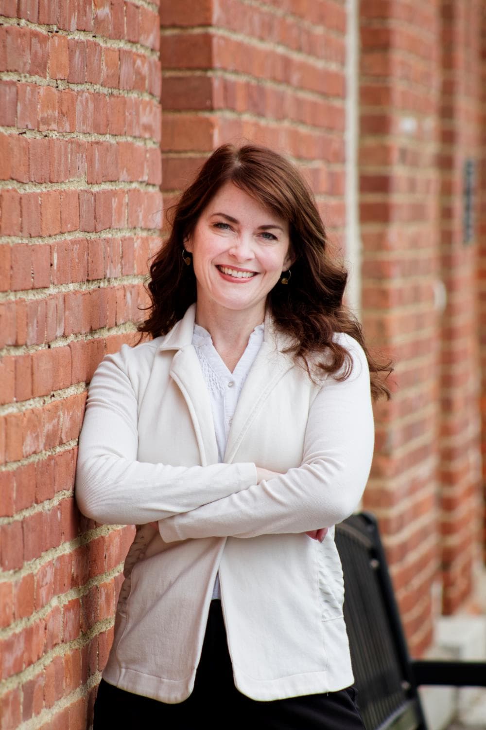 Headshot with Brick Wall Background
