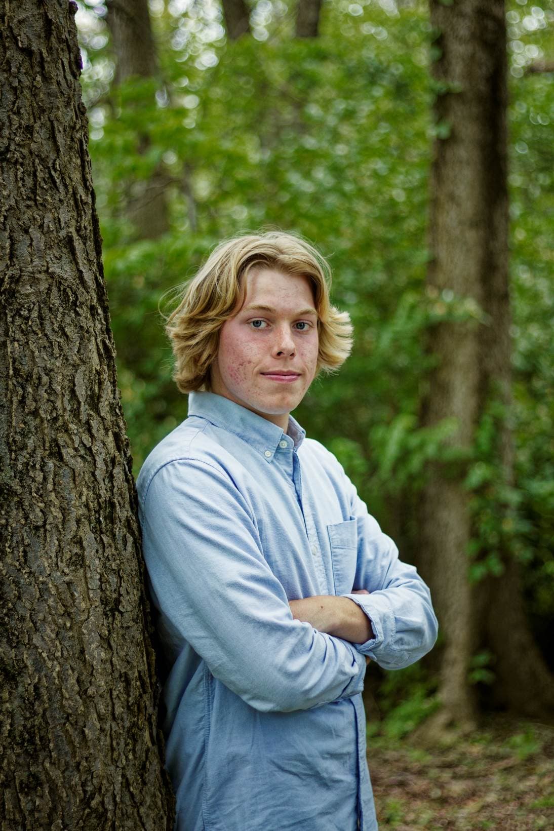 Senior Year Photo Against Tree